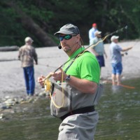 George Cook detailing the differences between single, two-handed, and switch rods.