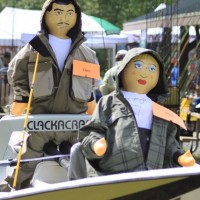 Sandy and Clave fishing from their boat.